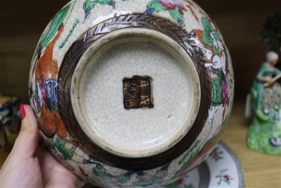 A Chinese crackle glaze bowl and jar, a pair of famille rose vases and two stone china plates